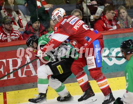 Eishockey ICE Bundesliga. KAC gegen Olimpija Ljubljana.  Nicholas Eric Petersen (KAC), Lovro Kumanovic  (Olimpija Ljubljana). Klagenfurt, am 26.10.2025
Foto: Kuess
---
pressefotos, pressefotografie, kuess, qs, qspictures, sport, bild, bilder, bilddatenbank