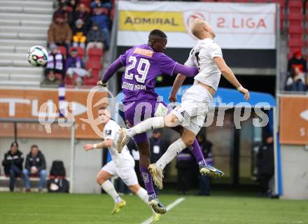 Fussball 2. Liga. SK Austria Klagenfurt gegen Amstetten.   Dimitrie Deumi Nappi  (Klagenfurt), David Peham  (Amstetten).  Klagenfurt, 22.11..2025.
Foto: Kuess
www.qspictures.net
---
pressefotos, pressefotografie, kuess, qs, qspictures, sport, bild, bilder, bilddatenbank