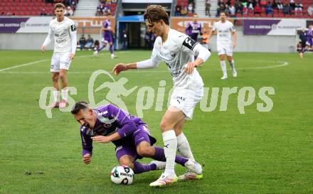 Fussball 2. Liga. SK Austria Klagenfurt gegen Amstetten.  Michael Lang  (Klagenfurt),  Matthias Gragger  (Amstetten).  Klagenfurt, 22.11..2025.
Foto: Kuess
www.qspictures.net
---
pressefotos, pressefotografie, kuess, qs, qspictures, sport, bild, bilder, bilddatenbank