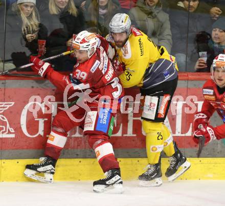 Eishockey ICE Bundesliga.  Winn2day ICE Hockey League. KAC gegen Vienna Capitals.  Filip Simovic  (KAC),   Jeremy Gregoire  (Vienna Capitals). Klagenfurt am 21.11.2025.
Foto: Kuess
www.qspictures.net
---
pressefotos, pressefotografie, kuess, qs, qspictures, sport, bild, bilder, bilddatenbank