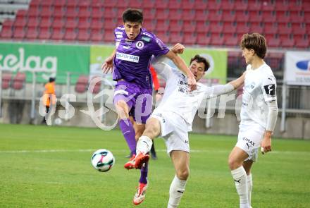 Fussball 2. Liga. SK Austria Klagenfurt gegen Amstetten. Aidan Liu   (Klagenfurt),  Martin Grubhofer  (Amstetten).  Klagenfurt, 22.11..2025.
Foto: Kuess
www.qspictures.net
---
pressefotos, pressefotografie, kuess, qs, qspictures, sport, bild, bilder, bilddatenbank
