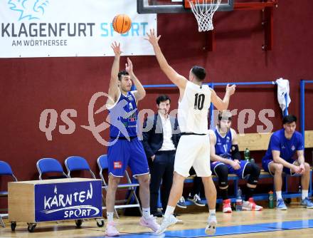 Basketball 2. Liga 2025/2026. Grunddurchgang 9. Runde.  KOS gegen Kufstein Towers.  Veljko Dena (KOS),  Pol Canovas,  (Kufstein). Klagenfurt, am 8.12.2025.
Foto: Kuess
---
pressefotos, pressefotografie, kuess, qs, qspictures, sport, bild, bilder, bilddatenbank