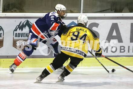 Eishockey AHC Division III Mitte.  EC Arnoldstein gegen HC Koettern I. Filippo Agnola (Arnoldstein),  Johannes Reichel  (Koettern). Velden,  am 19.12.2025.
Foto: Kuess
www.qspictures.net
---
pressefotos, pressefotografie, kuess, qs, qspictures, sport, bild, bilder, bilddatenbank