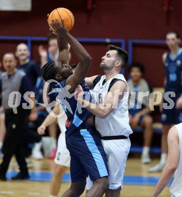 Basketball 2. Liga 2025/2026. Grunddurchgang 11. Runde.  KOS Celovec gegen Vienna Timberwolves.  Marin Sliskovic (KOS), Clinton Ogbevoen  (Vienna). Klagenfurt, am 20.12.2025.
Foto: Kuess
---
pressefotos, pressefotografie, kuess, qs, qspictures, sport, bild, bilder, bilddatenbank