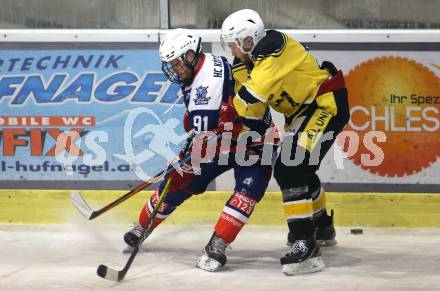 Eishockey AHC Division III Mitte.  EC Arnoldstein gegen HC Koettern I. Eldin Hadzic  (Arnoldstein), Stefan Geier   (Koettern). Velden,  am 19.12.2025.
Foto: Kuess
www.qspictures.net
---
pressefotos, pressefotografie, kuess, qs, qspictures, sport, bild, bilder, bilddatenbank