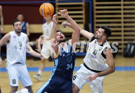 Basketball 2. Liga 2025/2026. Grunddurchgang 11. Runde.  KOS Celovec gegen Vienna Timberwolves.  Marin Sliskovic (KOS),  Kerim Dragolj (Vienna). Klagenfurt, am 20.12.2025.
Foto: Kuess
---
pressefotos, pressefotografie, kuess, qs, qspictures, sport, bild, bilder, bilddatenbank