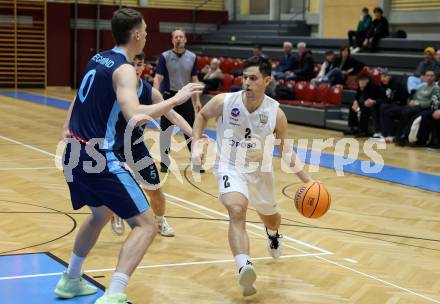 Basketball 2. Liga 2025/2026. Grunddurchgang 11. Runde.  KOS Celovec gegen Vienna Timberwolves.  Jure Bavdek (KOS),  Valentin Siegmund (Vienna). Klagenfurt, am 20.12.2025.
Foto: Kuess
---
pressefotos, pressefotografie, kuess, qs, qspictures, sport, bild, bilder, bilddatenbank