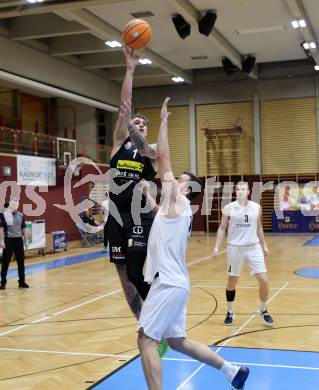 Basketball 2. Liga 2025/2026. Grunddurchgang 13. Runde.  KOS Celovec gegen BK Mattersburg Rocks.  Veljko Dena (KOS), Aleksandar Andjelkovic  (Mattersburg). Klagenfurt, am 10.1.2026
Foto: Kuess
---
pressefotos, pressefotografie, kuess, qs, qspictures, sport, bild, bilder, bilddatenbank