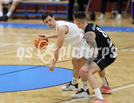 Basketball 2. Liga 2025/2026. Grunddurchgang 13. Runde.  KOS Celovec gegen BK Mattersburg Rocks.  Jure Bavdek (KOS),  Petar Zivkovic (Mattersburg). Klagenfurt, am 10.1.2026
Foto: Kuess
---
pressefotos, pressefotografie, kuess, qs, qspictures, sport, bild, bilder, bilddatenbank