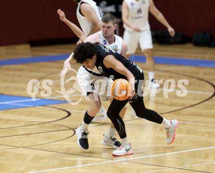 Basketball 2. Liga 2025/2026. Grunddurchgang 13. Runde.  KOS Celovec gegen BK Mattersburg Rocks.  Jernej Andolsek Heine  (KOS),  Yann Grandperret (Mattersburg). Klagenfurt, am 10.1.2026
Foto: Kuess
---
pressefotos, pressefotografie, kuess, qs, qspictures, sport, bild, bilder, bilddatenbank