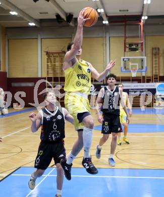 Basketball 2. Liga 2025/2026. Grunddurchgang 15. Runde.  Woerthersee Piraten gegen Vienna United. Elias Podany  (Piraten),  David Wrumnig (Vienna). Klagenfurt, am 24.1.2026
Foto: Kuess
---
pressefotos, pressefotografie, kuess, qs, qspictures, sport, bild, bilder, bilddatenbank