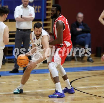 Basketball 2. Liga 2025/2026. Grunddurchgang 16. Runde.  KOS Celovec gegen Upper Austrian Ballers.   Veljko Dena (KOS),   Bruno Fernando (Austrian Ballers). Klagenfurt, am 31.1.2026
Foto: Kuess
---
pressefotos, pressefotografie, kuess, qs, qspictures, sport, bild, bilder, bilddatenbank