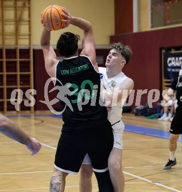 Basketball 2. Liga 2025/2026. Grunddurchgang 17. Runde.  KOS Celovec gegen Union Deutsch Wagram Alligators. Enes Avdic (KOS),  Harald Schmitt (UDW Alligators). Klagenfurt, am 7.2.2026
Foto: Kuess
---
pressefotos, pressefotografie, kuess, qs, qspictures, sport, bild, bilder, bilddatenbank
