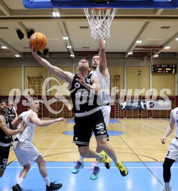 Basketball 2. Liga 2025/2026. Grunddurchgang 21. Runde.  KOS gegen Woerthersee Piraten.    Veljko Dena (KOS),  Jan-Arne Apschner (Piraten). Klagenfurt, am 8.3.2026
Foto: Kuess
---
pressefotos, pressefotografie, kuess, qs, qspictures, sport, bild, bilder, bilddatenbank