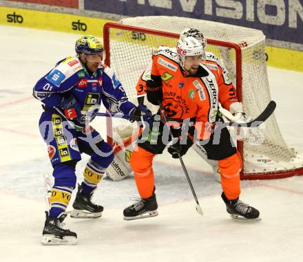 Eishockey ICE Bundesliga.  Winn2day ICE Hockey League. VSV gegen Graz99ers.   Nick Hutchison  (VSV),  Paul Stapelfeldt  (Graz). Villach, am 12.3.2026..
Foto: Kuess
www.qspictures.net
---
pressefotos, pressefotografie, kuess, qs, qspictures, sport, bild, bilder, bilddatenbank