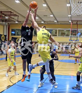 Basketball 2. Liga 2025/2026. Grunddurchgang 22. Runde.   Woerthersee Piraten gegen RAIDERS Tirol.  Marcus Holyfield  (Piraten),  Dennis Kaltenbrunner (Tirol). Klagenfurt, am 14.3.2026
Foto: Kuess
---
pressefotos, pressefotografie, kuess, qs, qspictures, sport, bild, bilder, bilddatenbank